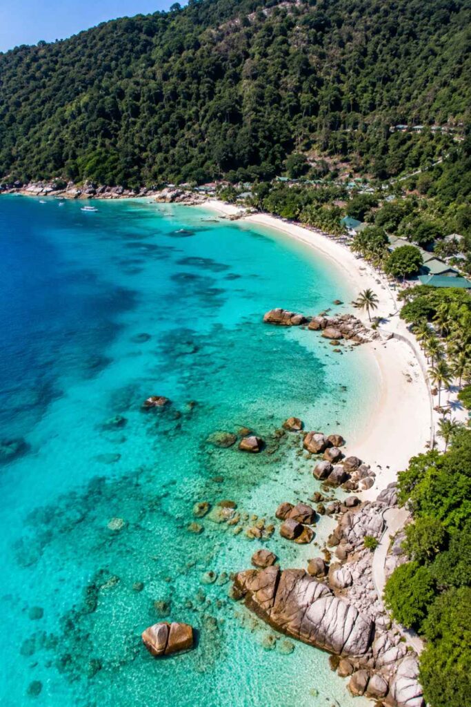 Best Things to Do in Malaysia for First-Time Visitors (Complete Guide) 7 Turquoise waters and white sand beach of Perhentian Islands from above